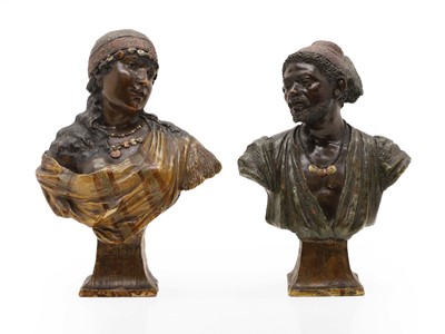 Lot 86 - A pair of Goldscheider painted terracotta busts