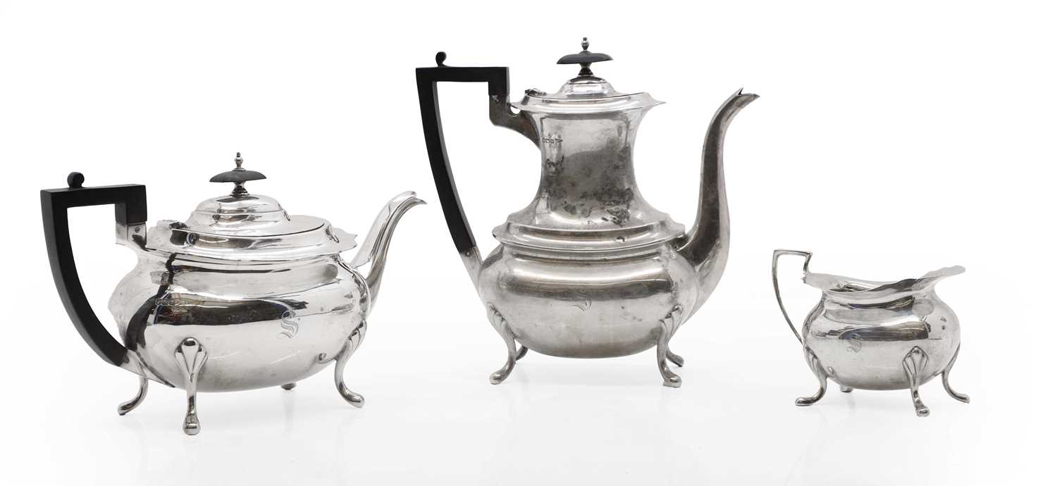 Lot 28 - A three piece silver tea service