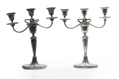 Lot 11 - A pair of silver three branch candelabra