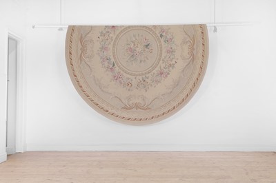 Lot 303 - An Aubusson circular needlepoint rug