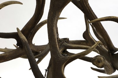Lot 389 - An antler seven-light chandelier