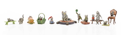 Lot 244 - A collection of painted bronze minature figures