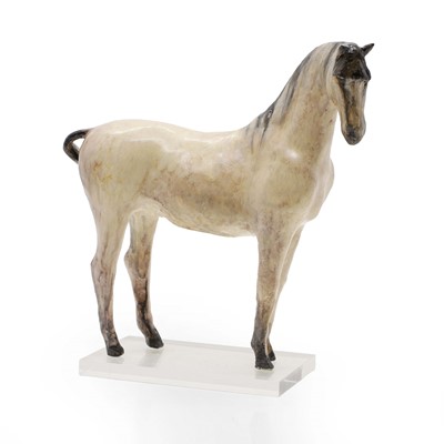 Lot 75 - A glazed stoneware figure of a horse