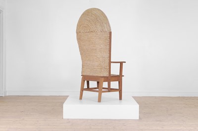 Lot 154 - An oak and woven seagrass Orkney chair