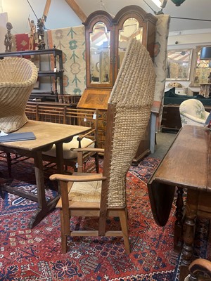 Lot 154 - An oak and woven seagrass Orkney chair
