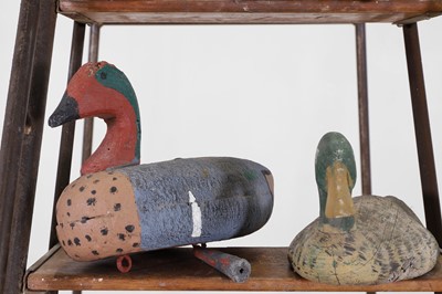 Lot 646 - A collection of painted wood and fibreglass decoy ducks