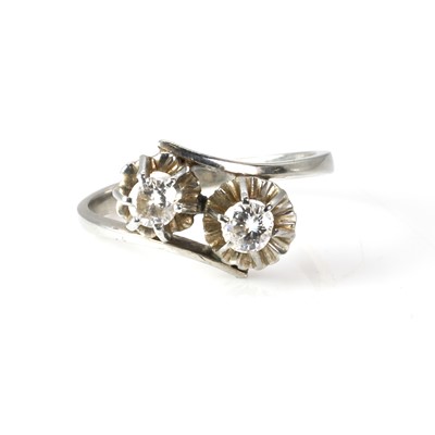 Lot 83 - A white gold diamond two stone ring