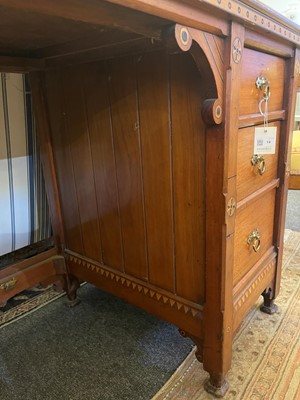 Lot 14 - A late Victorian Arts and Crafts walnut desk