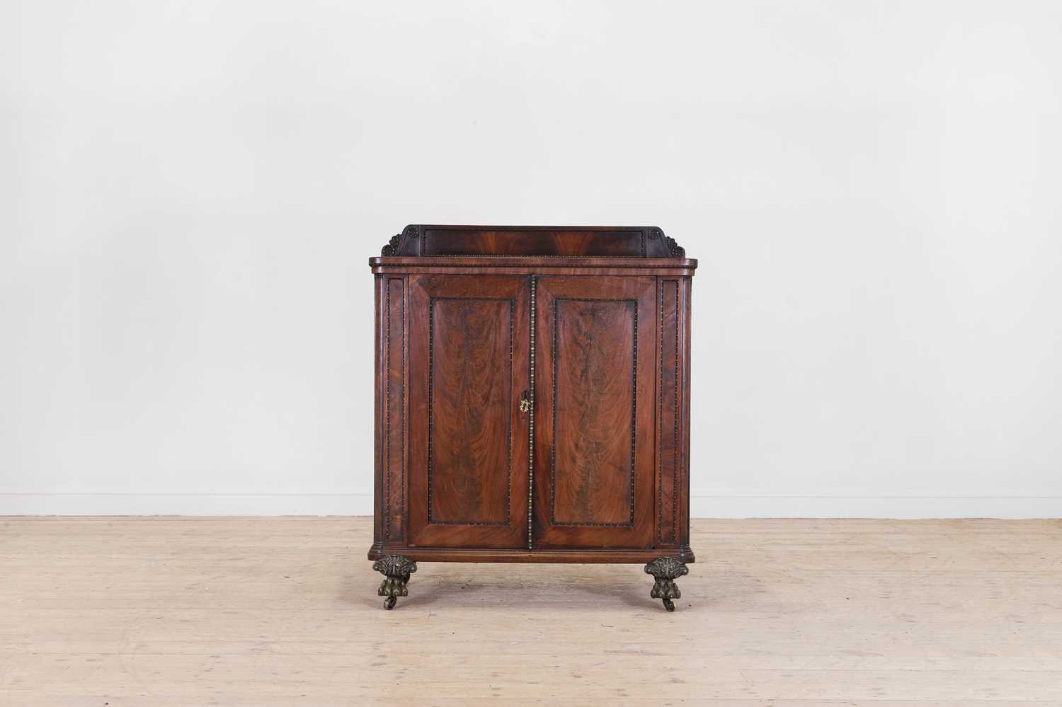 Lot 119 - A William IV mahogany cupboard