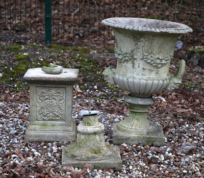 Lot 420 - A reconstituted stone urn