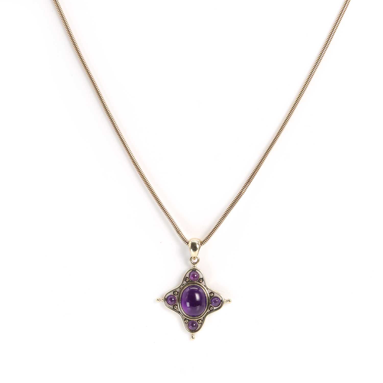 Lot 120 - A 9ct gold amethyst pendant,