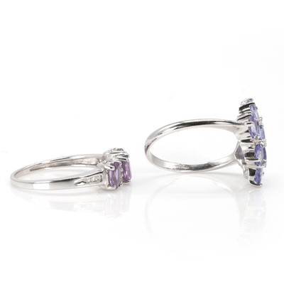 Lot 188 - A 9ct white gold tanzanite cluster ring and a 9ct white gold pink sapphire ring