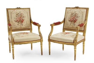 Lot 372 - The matching pair of open armchairs