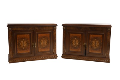 Lot 409 - A pair of French design marquetry pier cabinets