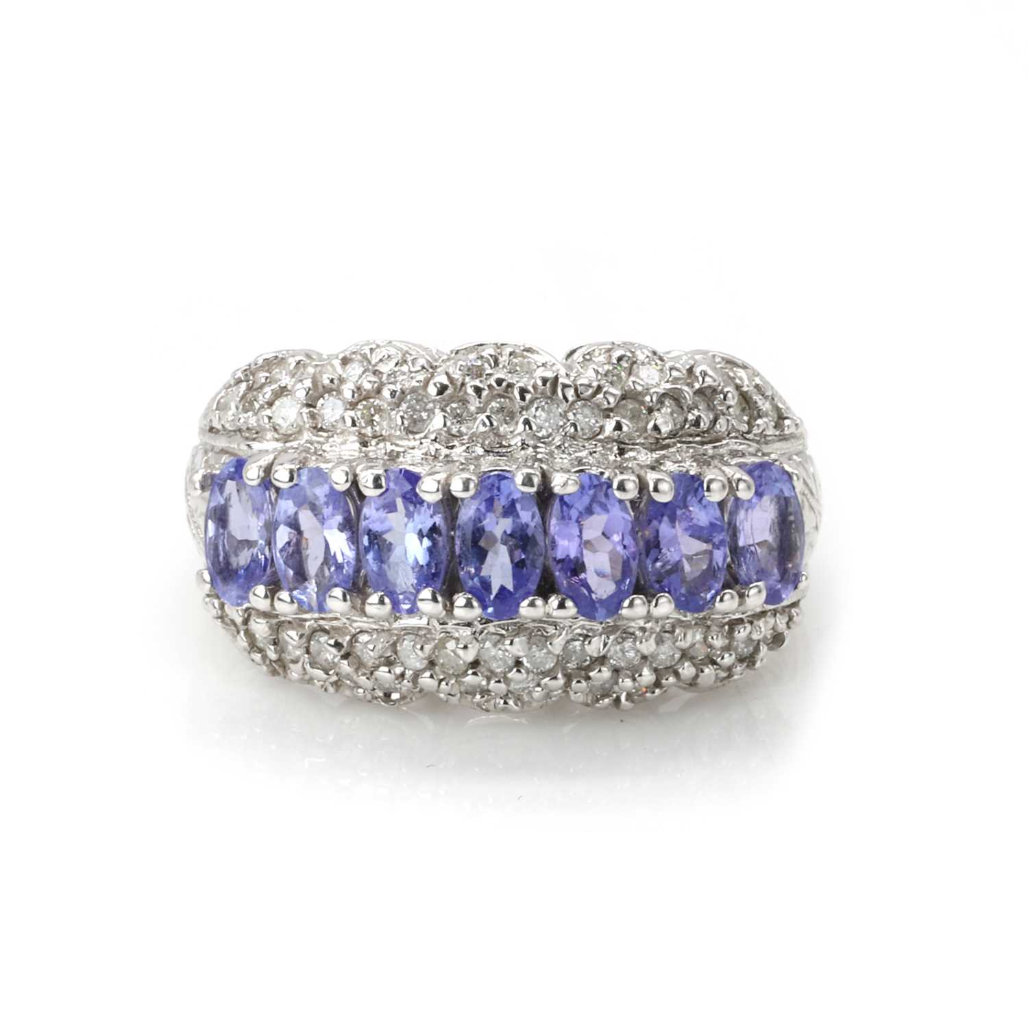 Lot 134 - A 14ct white gold sapphire and diamond ring