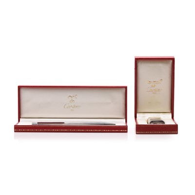 Lot 444 - A Cartier Trinity lighter and a Must de Cartier pen