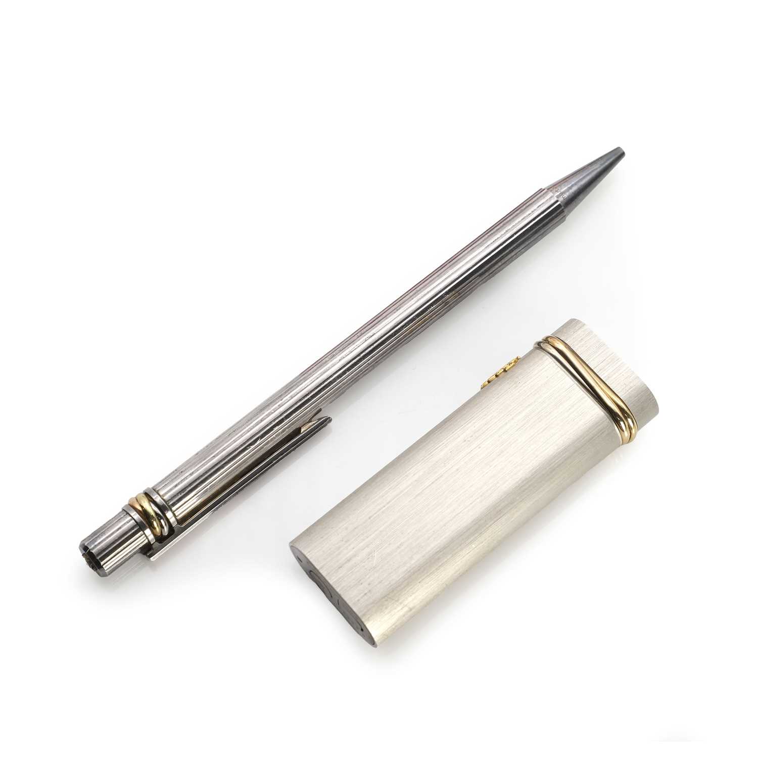 Lot 444 - A Cartier Trinity lighter and a Must de Cartier pen
