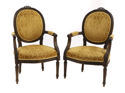 Lot 382 - A pair of Louis XVI style fauteuils