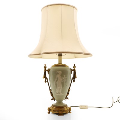 Lot 181 - A Sèvres-style porcelain and brass table lamp