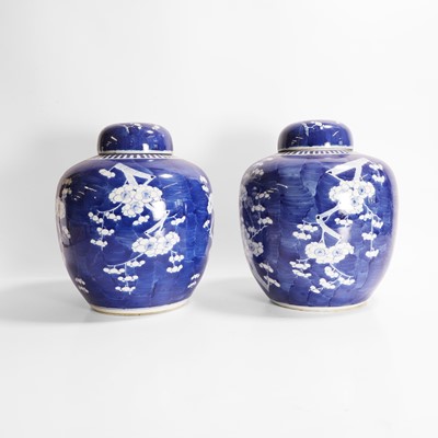 Lot 557 - A pair of Chinese blue and white jars and covers