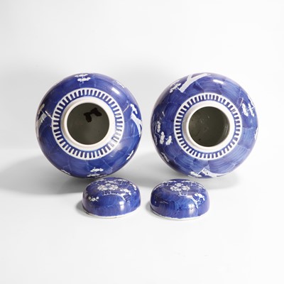 Lot 557 - A pair of Chinese blue and white jars and covers