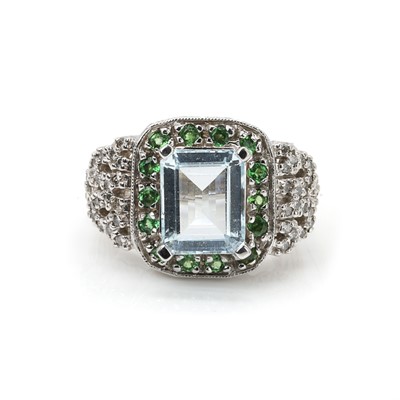 Lot 151 - A 14ct white gold aquamarine, garnet and diamond ring