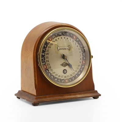 Lot 197 - A walnut cased 'Day Dial' calendar