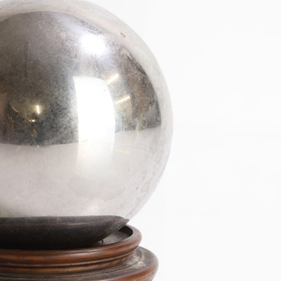 Lot 26 - An unusual silvered glass ball