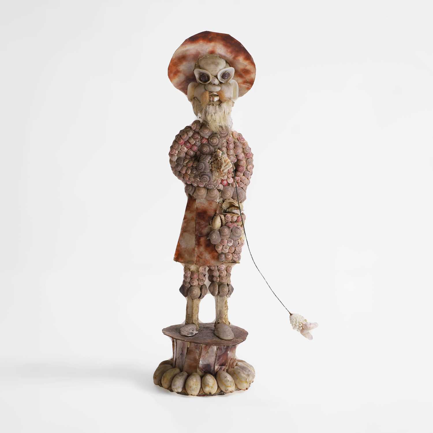 Lot 20 - A shellwork figure