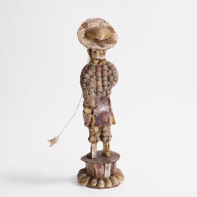Lot 20 - A shellwork figure