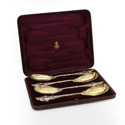 Lot 21 - A set of four Victorian silver-gilt strawberry spoons