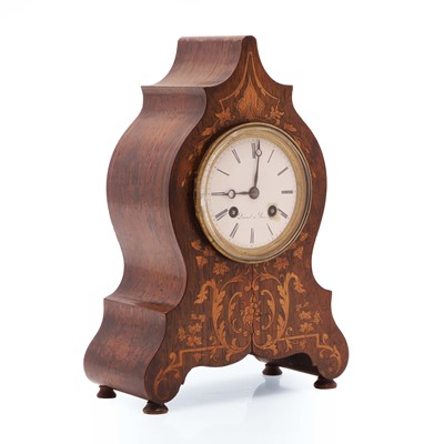 Lot 195 - A French inlaid rosewood mantle clock