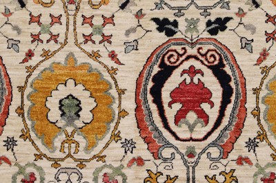 Lot 664 - A Suzani-inspired wool carpet