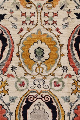 Lot 664 - A Suzani-inspired wool carpet
