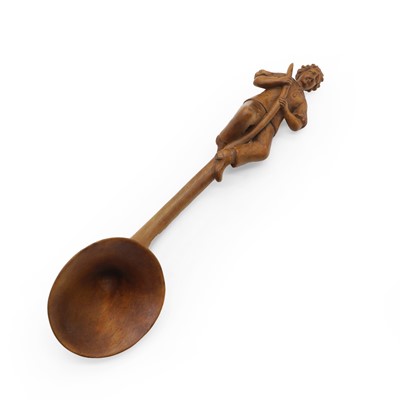 Lot 444 - A Swiss carved limewood spoon or horn