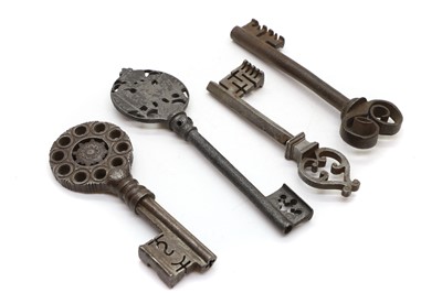 Lot 419 - A collection of four antique iron keys