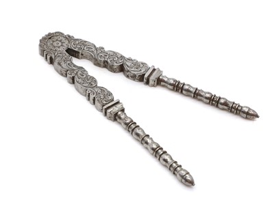 Lot 421 - A pair of cut steel nut crackers