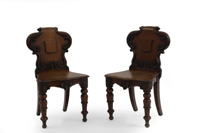 Lot 360 - A pair of early Victorian hall chairs