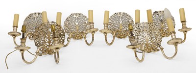 Lot 57 - A set of six silver plated twin branch wall sconces