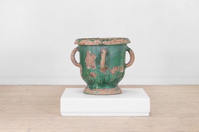 Lot 615 - A glazed terracotta urn