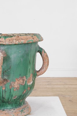 Lot 615 - A glazed terracotta urn