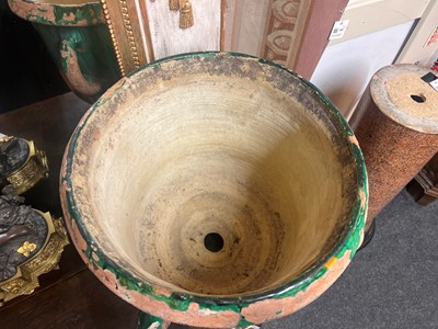 Lot 615 - A glazed terracotta urn