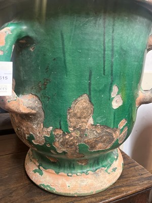 Lot 615 - A glazed terracotta urn