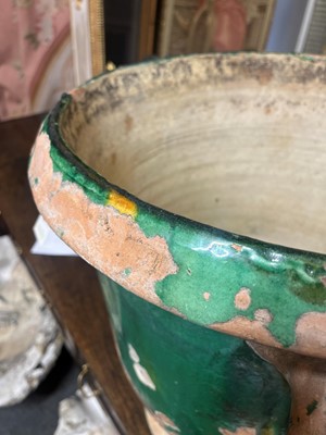 Lot 615 - A glazed terracotta urn