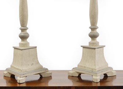 Lot 681 - A pair of Swedish Baroque-style painted wooden candlestick holders