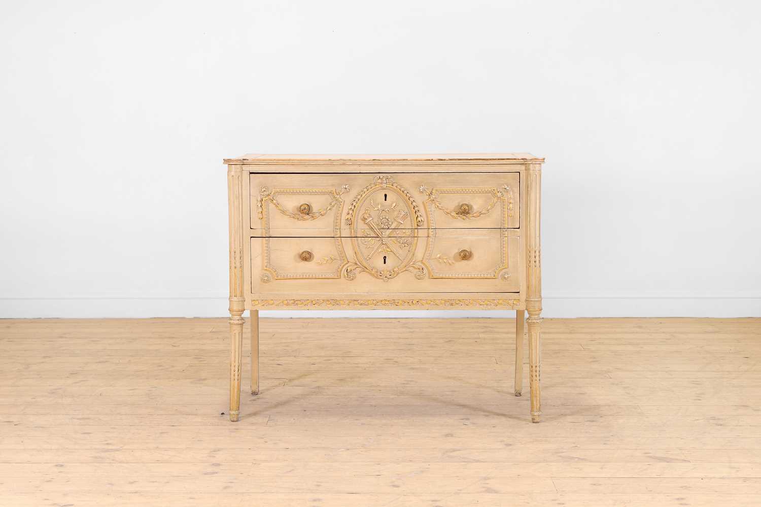 Lot 359 - A small Louis XVI-style painted and parcel-gilt wooden commode