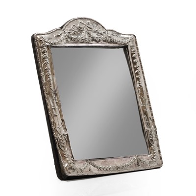 Lot 24 - A silver mounted dressing table mirror