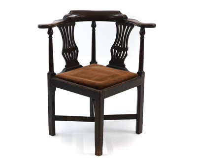 Lot 390 - A George III mahogany corner chair