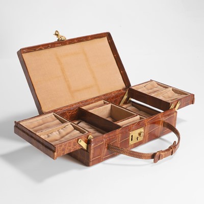 Lot 450 - An Asprey crocodile travelling jewellery case