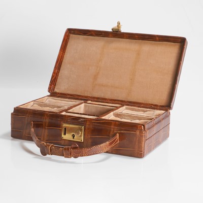 Lot 450 - An Asprey crocodile travelling jewellery case